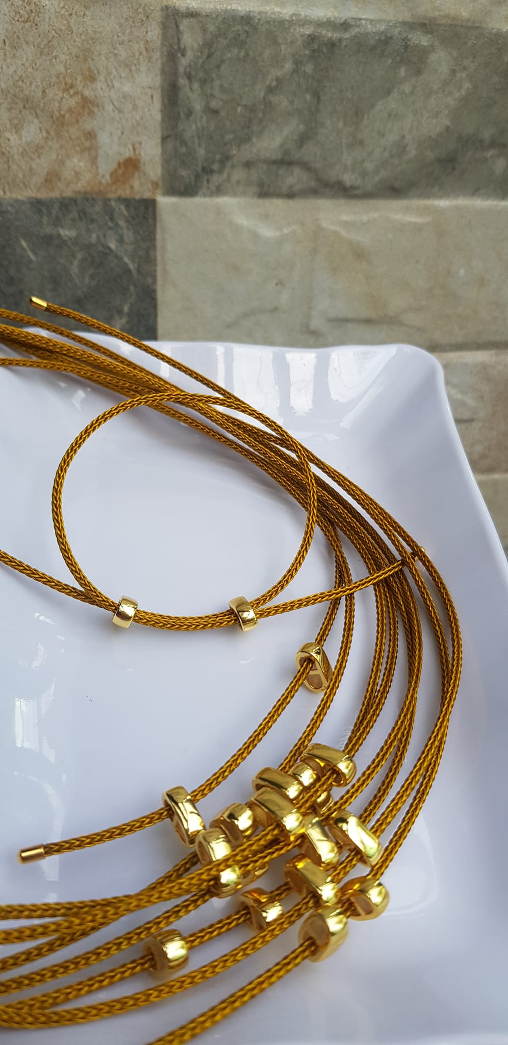 Dây thun VÀNG dẻo 2mm phối vòng tay Charm hạt đá hạt lu thống Size dây đỏ 2mm Nữ đã có hạt lu thống thì đây chính là sợi dây thun VÀNG phối với hạt lu thống đeo xinh ạ