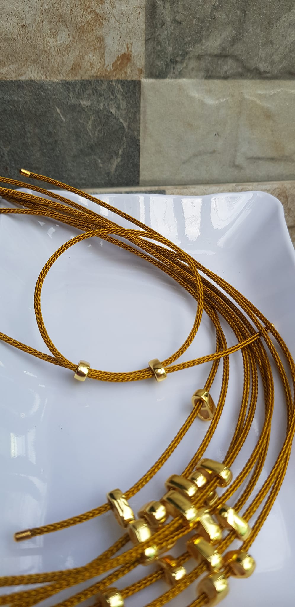 Dây thun VÀNG dẻo 2mm phối vòng tay Charm hạt đá hạt lu thống Size dây đỏ 2mm Nữ đã có hạt lu thống thì đây chính là sợi dây thun VÀNG phối với hạt lu thống đeo xinh ạ
