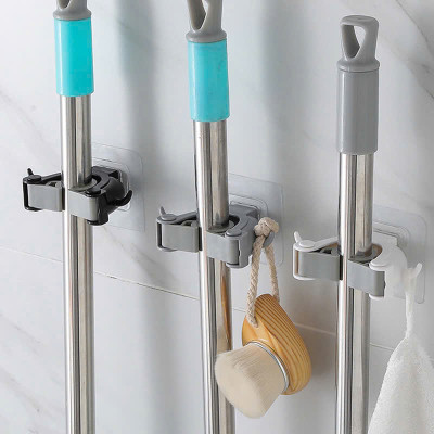 Dụng Cụ Kẹp Đồ Vật Dính Tường Siêu Chắc Có 2 Móc Treo