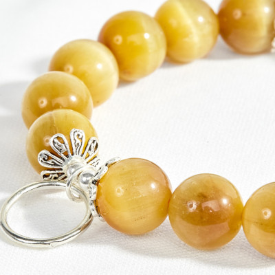 Vòng tay thạch anh mắt hổ vàng tâm phối charm tròn vuông tam giác Ngọc Quý Gemstone